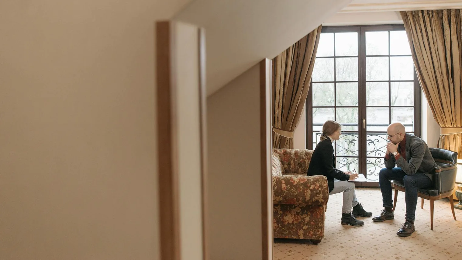 Candidate practicing a weakness answer with an interviewer in a quiet room