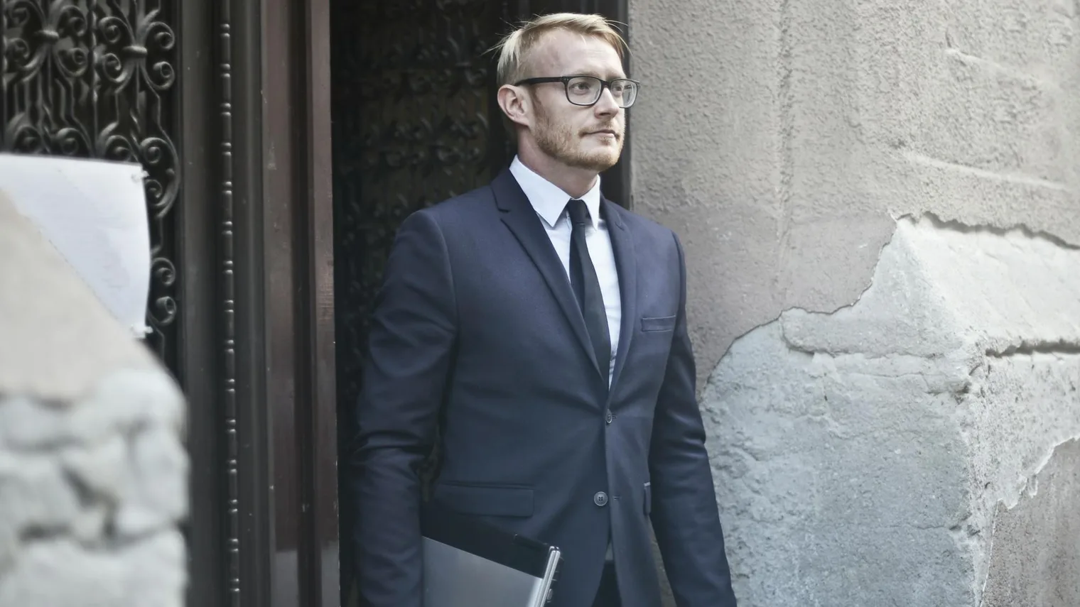 Professional interview outfit with blazer and laptop used to prepare for a job interview
