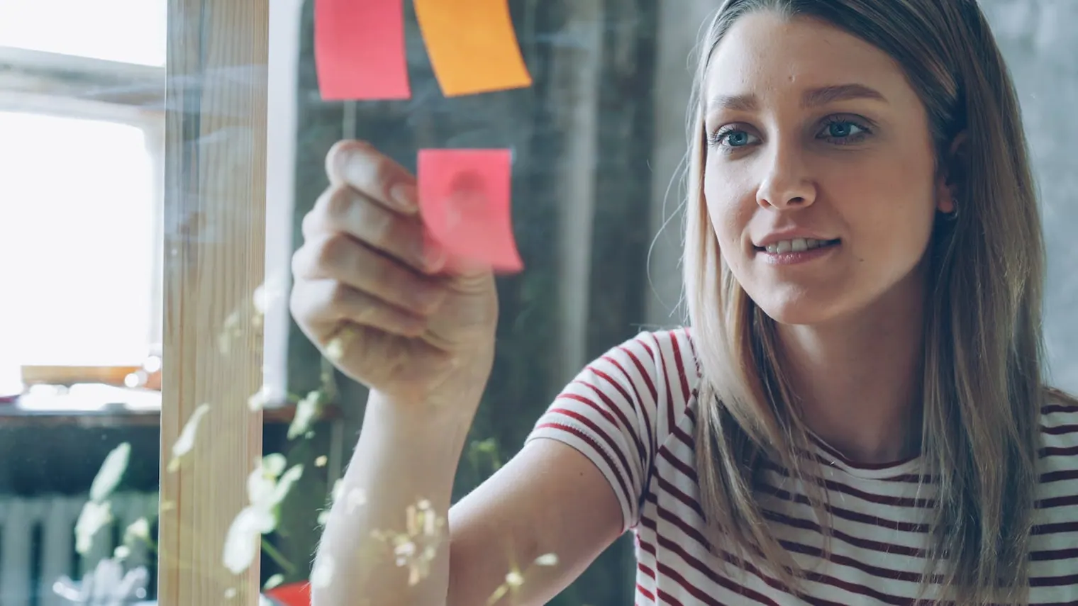 Behavioral interview story shortlist organized with sticky notes and role signals